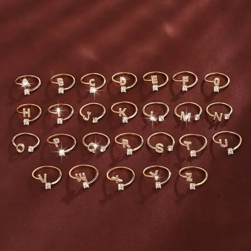 Adjustable Copper Initial Ring with Four-Claw Round Zirconia